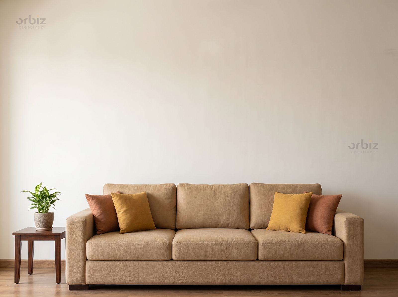A living room wall above a sofa