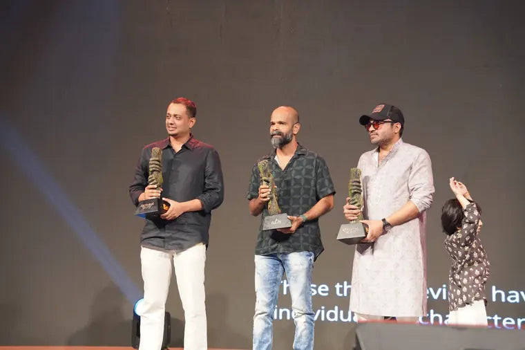 Recipients on stage with their mementos